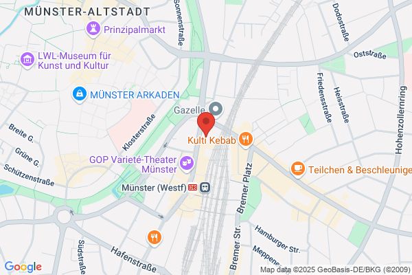 Versicherungsmakler Münster mit Fliege